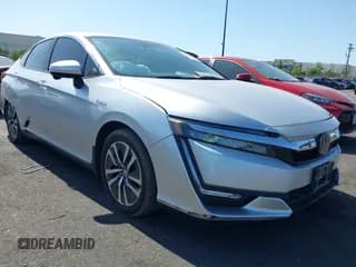 ✅ 2020 Honda Clarity Touring • VIN: JHMZC5F33LC001657 • Lot: 42532082. Wystawiony na IAAI z przebiegiem 53 605 mil. Bezpłatny archiwum sprzedaży aukcyjnych z USA i szczegółowy raport historii pojazdu na DreamBid. Zdjęcie 1.