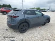 ✅ 2023 Mazda CX-30 S Carbon Edition • VIN: 3MVDMBCM2PM539130 • Лот: 54817735. Опубликован ранее на Copart с пробегом 29 678 миль. Бесплатный доступ к архиву аукционных продаж из США и подробный отчёт об истории автомобиля на DreamBid. Изображение 3.