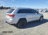 ✅ 2011 Jeep Grand Cherokee Overland • VIN: 1J4RR6GT7BC604866 • Lot: 91003765. Listed on Copart with 128,314 mi. Free auction sales archive from the USA and detailed vehicle history report at DreamBid. Image 3.