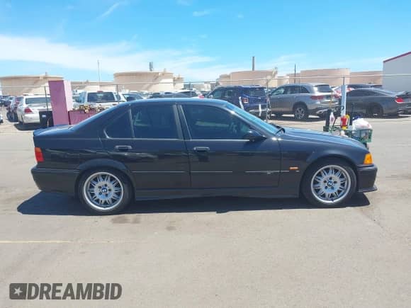 1997 BMW 3 Series M3s with VIN WBSCD932XVEE05100, listed as a IAAI auction lot 42715104 with 216,125 mi miles and . Bid and sale history available at DreamBid. Image 14.