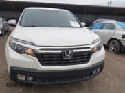 ✅ 2019 Honda Ridgeline RTL • VIN: 5FPYK2F5XKB004418 • Lot: 43572773. Listed on IAAI with 70,040 mi. Free auction sales archive from the USA and detailed vehicle history report at DreamBid. Image 6.