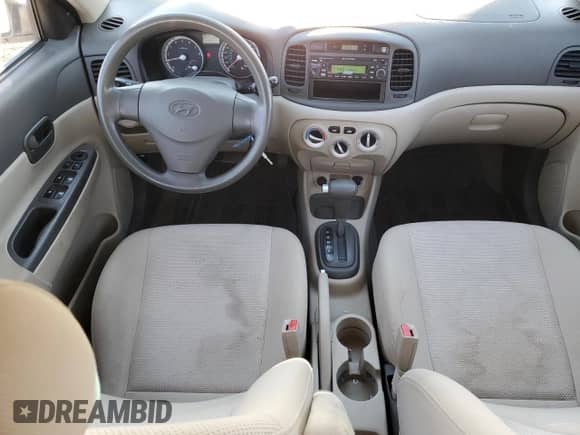 2008 Hyundai Accent L с VIN KMHCN45C98U263130, выставлен на аукционе Copart как лот 77775144 с пробегом 185 526 миль миль и Чистый • Clean title. История ставок и продаж доступна на DreamBid. Изображение 8.