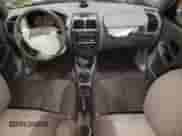 2004 Hyundai Accent GL with VIN KMHCG45C24U564570, listed as a Copart auction lot 82090484 with 69,000 mi miles and Salvage title. Bid and sale history available at DreamBid. Image 8.