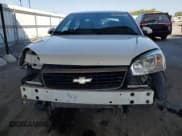 ✅ 2006 Chevrolet Malibu 0LT • VIN: 1G1ZT51F06F206450 • Lot: 80566865. Listed on Copart with 128,023 mi. Free auction sales archive from the USA and detailed vehicle history report at DreamBid. Image 5.