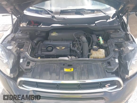 ✅ 2015 MINI Countryman S • VIN: WMWZC5C5XFWT38155 • Lot: 43134965. Listed on IAAI with 190,711 mi. Free auction sales archive from the USA and detailed vehicle history report at DreamBid. Image 10.