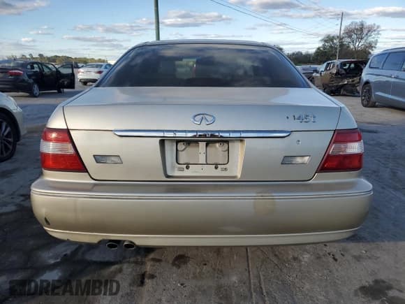 ✅ 1999 Infiniti Q45 • VIN: JNKBY31A1XM605401 • Lot: 76582304. Wystawiony na Copart z przebiegiem 115 791 mil. Bezpłatny archiwum sprzedaży aukcyjnych z USA i szczegółowy raport historii pojazdu na DreamBid. Zdjęcie 6.