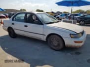 ✅ 1995 Toyota Corolla DX • VIN: 1NXAE09B9SZ328745 • Lot: 71040755. Wystawiony na Copart z przebiegiem 218 951 mil. Bezpłatny archiwum sprzedaży aukcyjnych z USA i szczegółowy raport historii pojazdu na DreamBid. Zdjęcie 4.