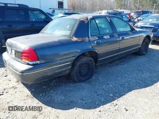 ✅ 1998 Ford Crown Victoria Police • VIN: 2FAFP71WXWX184526 • Лот: 41563307. Опубликован ранее на IAAI с пробегом 309 303 миль. Бесплатный доступ к архиву аукционных продаж из США и подробный отчёт об истории автомобиля на DreamBid. Изображение 4.