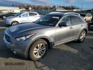 ✅ 2014 Infiniti QX70 • VIN: JN8CS1MW8EM410965 • Lot: 92624715. Listed on Copart with 112,231 mi. Free auction sales archive from the USA and detailed vehicle history report at DreamBid. Image 1.