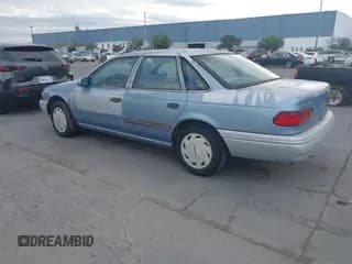 ✅ 1992 Ford Taurus • VIN: 1FACP52U4NG186331 • Lot: 43687700. Listed on IAAI with 198,053 mi. Free auction sales archive from the USA and detailed vehicle history report at DreamBid. Image 3.