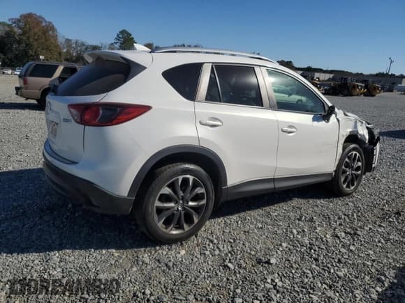 ✅ 2016 Mazda CX-5 Grand Touring • VIN: JM3KE4DY9G0790465 • Lot: 92579735. Wystawiony na Copart z przebiegiem 190 503 mil. Bezpłatny archiwum sprzedaży aukcyjnych z USA i szczegółowy raport historii pojazdu na DreamBid. Zdjęcie 3.