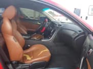 ✅ 2012 Hyundai Genesis Coupe Grand Touring • VIN: KMHHU6KH0CU078557 • Lot: 42106396. Wystawiony na IAAI z przebiegiem 171 913 mil. Bezpłatny archiwum sprzedaży aukcyjnych z USA i szczegółowy raport historii pojazdu na DreamBid. Zdjęcie 5.