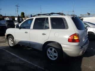 2002 Hyundai Santa Fe GLS с VIN KM8SC13D32U303804, выставлен на аукционе Copart как лот 51213805 с пробегом 201 919 миль миль и Списание • Salvage title. История ставок и продаж доступна на DreamBid. Изображение 2.
