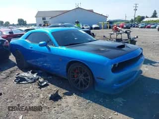 2016 Dodge Challenger SRT Hellcat z VIN 2C3CDZC99GH239248, wystawiony jako IAAI lot #42839430 z przebiegiem 46 075 mil mil oraz . Historia ofert i sprzedaży dostępna na DreamBid. Obrazek 1.