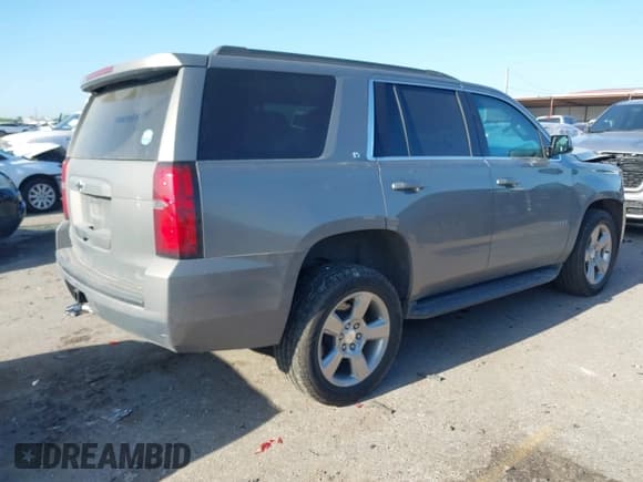✅ 2019 Chevrolet Tahoe LT • VIN: 1GNSCBKC7KR211527 • Lot: 42004179. Listed on IAAI with 36,593 mi. Free auction sales archive from the USA and detailed vehicle history report at DreamBid. Image 4.