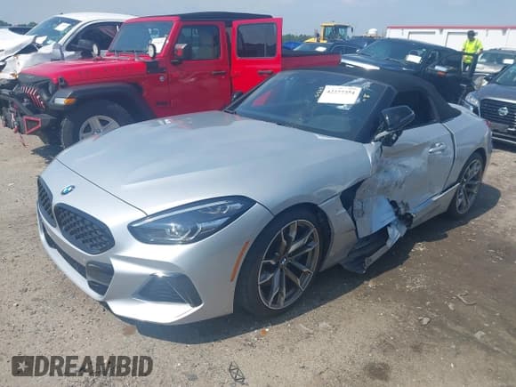 ✅ 2021 BMW Z4 sDriveM40i • VIN: WBAHF9C00MWX17614 • Лот: 42277354. Опубликован ранее на IAAI с пробегом 26 615 миль. Бесплатный доступ к архиву аукционных продаж из США и подробный отчёт об истории автомобиля на DreamBid. Изображение 2.