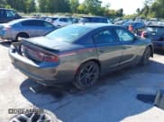 ✅ 2022 Dodge Charger SXT • VIN: 2C3CDXBGXNH243973 • Lot: 43348549. Listed on IAAI with 32,913 mi. Free auction sales archive from the USA and detailed vehicle history report at DreamBid. Image 4.