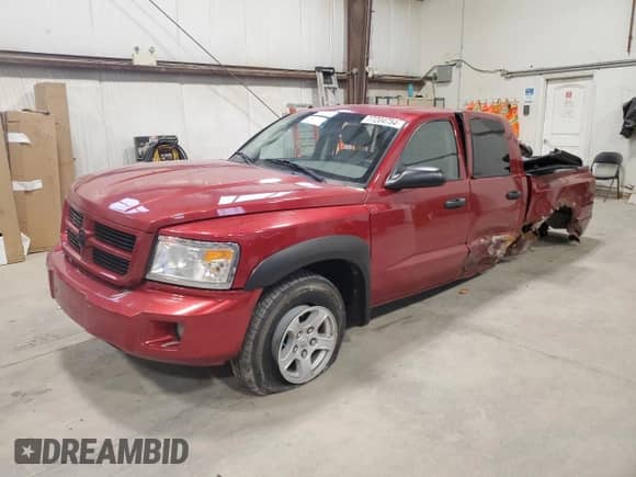2008 Dodge Dakota z VIN 1D7HW38N38S535025, wystawiony jako Copart lot #77204754 z przebiegiem 245 225 mil mil oraz Szkoda całkowita • Salvage title. Historia ofert i sprzedaży dostępna na DreamBid. Obrazek 1.