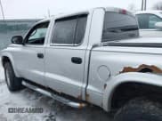 ✅ 2004 Dodge Dakota SLT • VIN: 1D7HG48N34S665027 • Lot: 41395509. Wystawiony na IAAI z przebiegiem 128 064 mil. Bezpłatny archiwum sprzedaży aukcyjnych z USA i szczegółowy raport historii pojazdu na DreamBid. Zdjęcie 14.