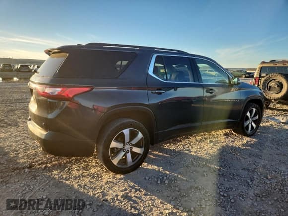 ✅ 2021 Chevrolet Traverse LT • VIN: 1GNEVHKW0MJ153184 • Lot: 90905875. Wystawiony na Copart z przebiegiem 254 043 mil. Bezpłatny archiwum sprzedaży aukcyjnych z USA i szczegółowy raport historii pojazdu na DreamBid. Zdjęcie 3.