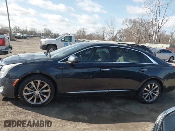 ✅ 2013 Cadillac XTS Luxury • VIN: 2G61P5S37D9202529 • Lot: 41883139. Wystawiony na IAAI z przebiegiem 79 187 mil. Bezpłatny archiwum sprzedaży aukcyjnych z USA i szczegółowy raport historii pojazdu na DreamBid. Zdjęcie 13.