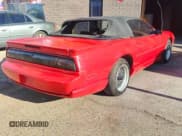 ✅ 1991 Pontiac Firebird • VIN: 1G2FW33F9ML242143 • Lot: 42241085. Listed on Copart with 141,734 mi. Free auction sales archive from the USA and detailed vehicle history report at DreamBid. Image 4.