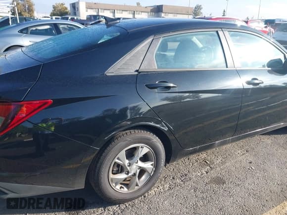 ✅ 2021 Hyundai Elantra SE • VIN: 5NPLL4AG5MH036590 • Lot: 43476534. Listed on IAAI with 70,995 mi. Free auction sales archive from the USA and detailed vehicle history report at DreamBid. Image 18.