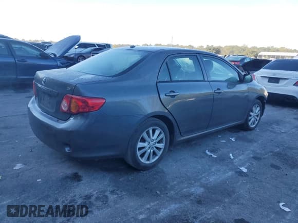 ✅ 2010 Toyota Corolla • VIN: 2T1BU4EE6AC382826 • Lot: 87296835. Listed on Copart with 102,298 mi. Free auction sales archive from the USA and detailed vehicle history report at DreamBid. Image 3.