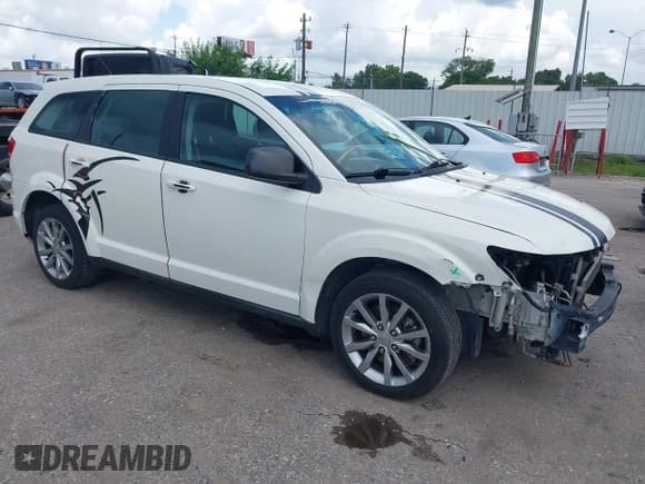 ✅ 2014 Dodge Journey SE • VIN: 3C4PDCAB8ET148539 • Lot: 42674214. Listed on IAAI with 172,272 mi. Free auction sales archive from the USA and detailed vehicle history report at DreamBid. Image 1.