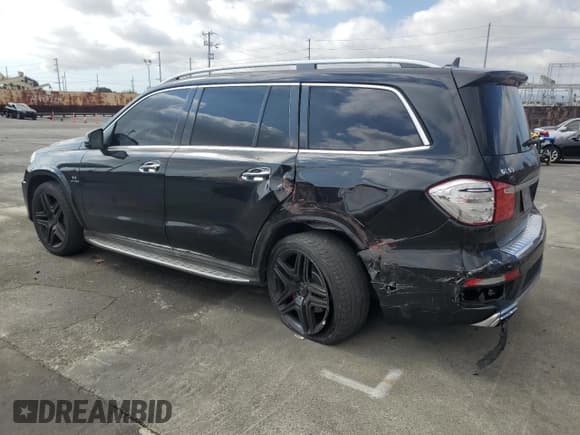 ✅ 2015 Mercedes-Benz GL 63 AMG • VIN: 4JGDF7EE9FA445980 • Lot: 82615665. Listed on Copart with 128,834 mi. Free auction sales archive from the USA and detailed vehicle history report at DreamBid. Image 2.