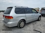 ✅ 2003 Honda Odyssey EX-L • VIN: 5FNRL18903B028216 • Lot: 66751834. Listed on Copart with Not provided. Free auction sales archive from the USA and detailed vehicle history report at DreamBid. Image 3.