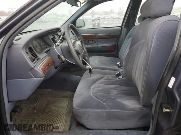 ✅ 1997 Mercury Grand Marquis GS • VIN: 2MELM74W4VX707814 • Lot: 81570244. Wystawiony na Copart z przebiegiem 155 752 mil. Bezpłatny archiwum sprzedaży aukcyjnych z USA i szczegółowy raport historii pojazdu na DreamBid. Zdjęcie 7.