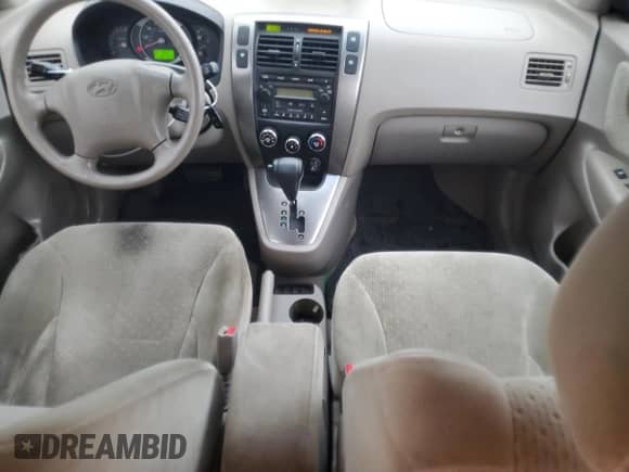 2005 Hyundai Tucson GLS z VIN KM8JN72DX5U214908, wystawiony jako Copart lot #76346024 z przebiegiem 152 677 mil mil oraz Szkoda całkowita • Salvage title. Historia ofert i sprzedaży dostępna na DreamBid. Obrazek 8.