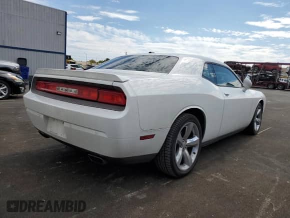 2013 Dodge Challenger SXT с VIN 2C3CDYAG0DH531104, выставлен на аукционе Copart как лот 86182715 с пробегом 152 424 миль миль и Списание • Salvage title. История ставок и продаж доступна на DreamBid. Изображение 3.