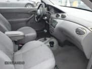 ✅ 2003 Ford Focus ZX3 • VIN: 3FAFP31Z23R147547 • Lot: 42426117. Listed on IAAI with 129,860 mi. Free auction sales archive from the USA and detailed vehicle history report at DreamBid. Image 5.