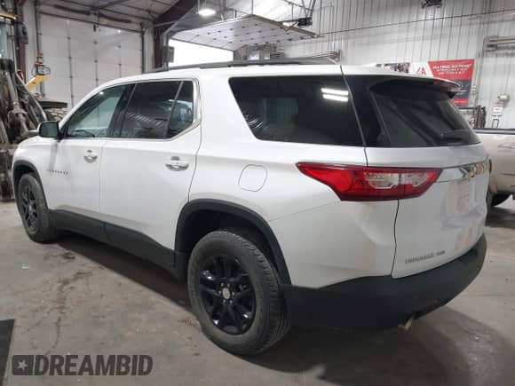 2019 Chevrolet Traverse LT Cloth z VIN 1GNEVGKW1KJ298306, wystawiony jako IAAI lot #43302460 z przebiegiem 76 785 mil mil oraz . Historia ofert i sprzedaży dostępna na DreamBid. Obrazek 3.