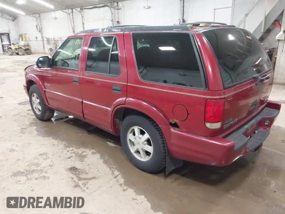 ✅ 1999 Oldsmobile Bravada • VIN: 1GHDT13W9X2701952 • Lot: 42093184. Wystawiony na IAAI z przebiegiem 121 532 mil. Bezpłatny archiwum sprzedaży aukcyjnych z USA i szczegółowy raport historii pojazdu na DreamBid. Zdjęcie 3.