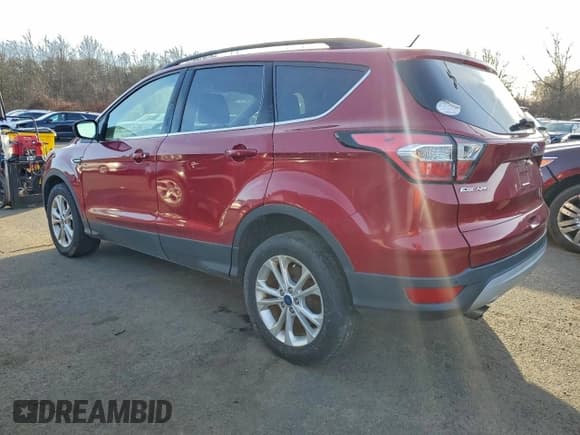 ✅ 2017 Ford Escape SE • VIN: 1FMCU9GD2HUC57546 • Lot: 94936545. Listed on Copart with 106,837 mi. Free auction sales archive from the USA and detailed vehicle history report at DreamBid. Image 2.