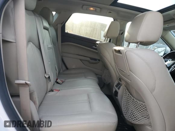 ✅ 2016 Cadillac SRX Premium Collection • VIN: 3GYFNDE37GS551769 • Lot: 69224115. Wystawiony na Copart z przebiegiem 113 338 mil. Bezpłatny archiwum sprzedaży aukcyjnych z USA i szczegółowy raport historii pojazdu na DreamBid. Zdjęcie 11.