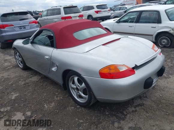 ✅ 2000 Porsche Boxster • VIN: WP0CA2983YU624913 • Лот: 41810897. Опубликован ранее на IAAI с пробегом 124 393 миль. Бесплатный доступ к архиву аукционных продаж из США и подробный отчёт об истории автомобиля на DreamBid. Изображение 3.