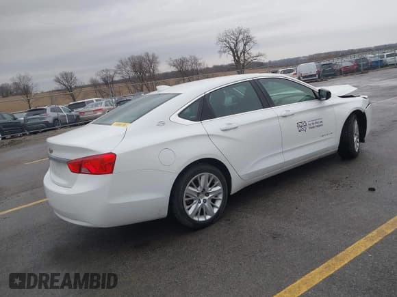 ✅ 2017 Chevrolet Impala LS • VIN: 2G11X5S3XH9157565 • Lot: 41711415. Listed on IAAI with 71,234 mi. Free auction sales archive from the USA and detailed vehicle history report at DreamBid. Image 4.