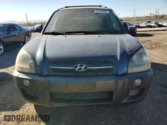 2005 Hyundai Tucson GLS with VIN KM8JN12D25U211028, listed as a Copart auction lot 91035095 with 187,604 mi miles and Salvage title. Bid and sale history available at DreamBid. Image 5.