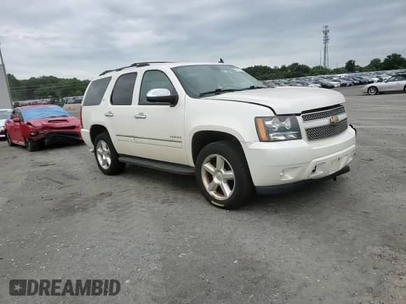 2013 Chevrolet Tahoe LTZ z VIN 1GNSKCE0XDR192002, wystawiony jako Copart lot #65217315 z przebiegiem 125 727 mil mil oraz Szkoda całkowita • Salvage title. Historia ofert i sprzedaży dostępna na DreamBid. Obrazek 14.