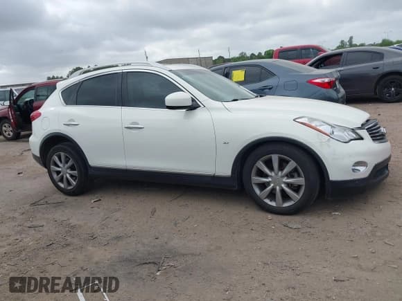 ✅ 2015 Infiniti QX50 Journey • VIN: JN1BJ0HP6FM730376 • Lot: 41939546. Wystawiony na IAAI z przebiegiem 115 136 mil. Bezpłatny archiwum sprzedaży aukcyjnych z USA i szczegółowy raport historii pojazdu na DreamBid. Zdjęcie 13.