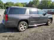 2017 Chevrolet Suburban Premier z VIN 1GNSKJKC2HR129663, wystawiony jako Copart lot #68574504 z przebiegiem 152 922 mil mil oraz Szkoda całkowita • Salvage title. Historia ofert i sprzedaży dostępna na DreamBid. Obrazek 3.