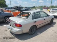 ✅ 1999 Toyota Corolla VE • VIN: 1NXBR12E2XZ214726 • Lot: 43005806. Listed on IAAI with 295,368 mi. Free auction sales archive from the USA and detailed vehicle history report at DreamBid. Image 4.