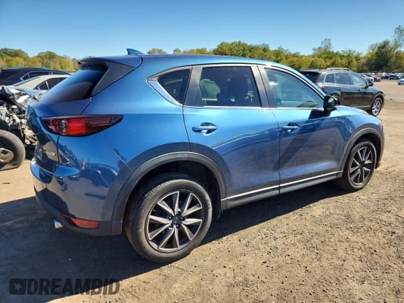 ✅ 2018 Mazda CX-5 Touring • VIN: JM3KFBCM2J0463400 • Lot: 82402885. Listed on Copart with 63,115 mi. Free auction sales archive from the USA and detailed vehicle history report at DreamBid. Image 3.