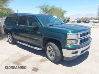 ✅ 2015 Chevrolet Silverado 1500 LT • VIN: 3GCUKREC0FG132537 • Lot: 42619060. Listed on IAAI with 131,255 mi. Free auction sales archive from the USA and detailed vehicle history report at DreamBid. Image 1.