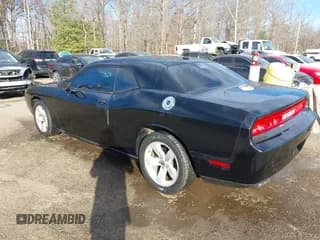 ✅ 2013 Dodge Challenger SXT • VIN: 2C3CDYAG5DH591010 • Lot: 41649468. Wystawiony na IAAI z przebiegiem 159 327 mil. Bezpłatny archiwum sprzedaży aukcyjnych z USA i szczegółowy raport historii pojazdu na DreamBid. Zdjęcie 3.