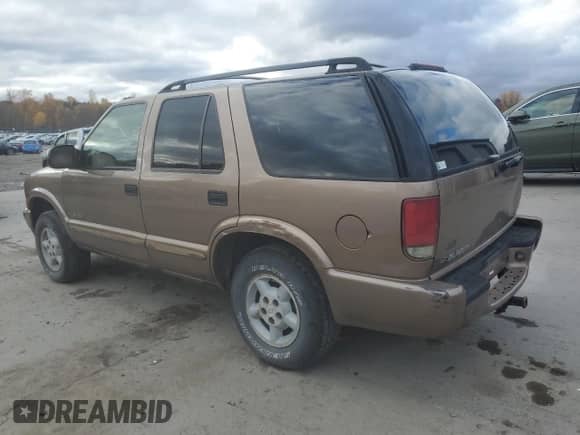 2004 Chevrolet Blazer LS с VIN 1GNDT13X24K123615, выставлен на аукционе Copart как лот 77460534 с пробегом 133 079 миль миль и Списание • Salvage title. История ставок и продаж доступна на DreamBid. Изображение 2.
